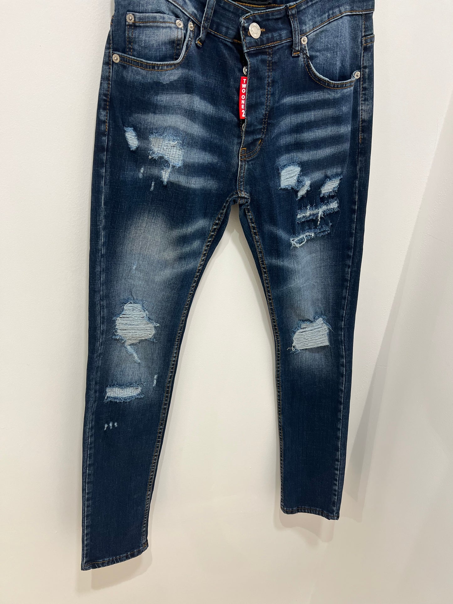 Jeans bleu déchiré