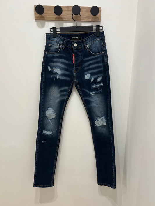 Jeans bleu déchiré